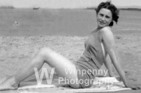 woman on beach after photo restored